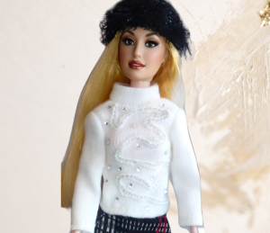 Doll wearing black beanie from Romantic Rebel Collection